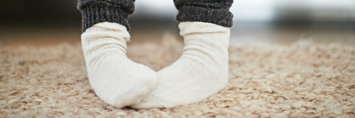 Innesteling bevorderen met warmte: warme sokken
